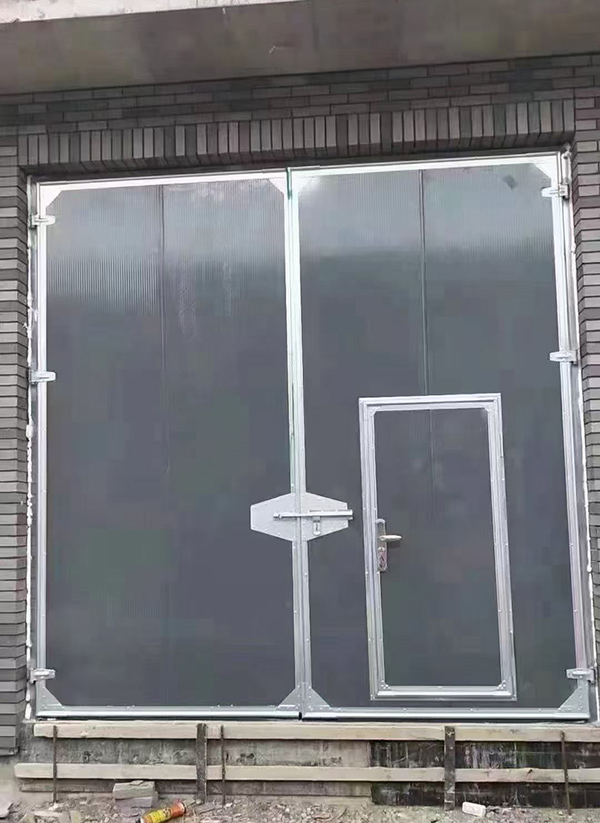 安宁工业平开门在大型设备制造车间的应用实例 安宁工业平开门在大型设备制造车间的应用实例